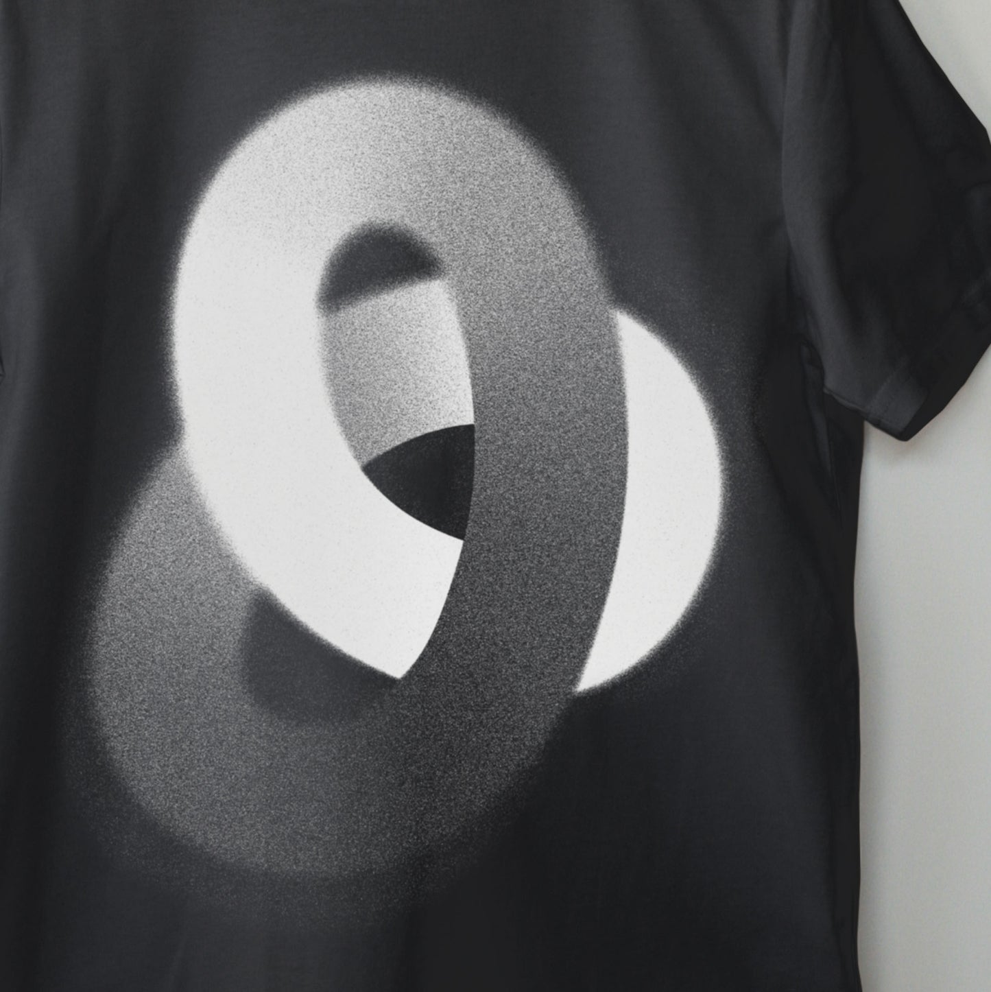 Close up detail image of 'Loop'. Black T-Shirt. Contemporary Eurorack Synth T-Shirt for Electronic Music Festival T-Shirt – Vegan T-Shirt – PETA Approved and 100% organic cotton
