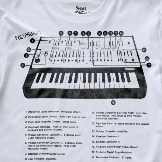 A white synth t-shirt featuring a printed graphic of an ARP Odyssey with numbered callouts and a features list of effects and controls below.