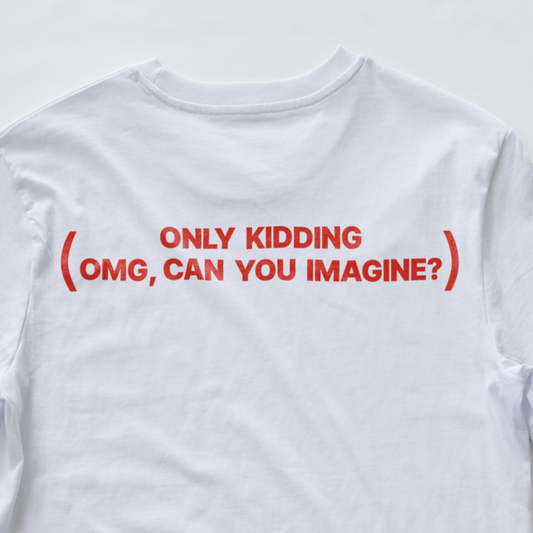 A white electronic music t-shirt with red printed text on the back reading 'ONLY KIDDING (OMG, CAN YOU IMAGINE?)'.