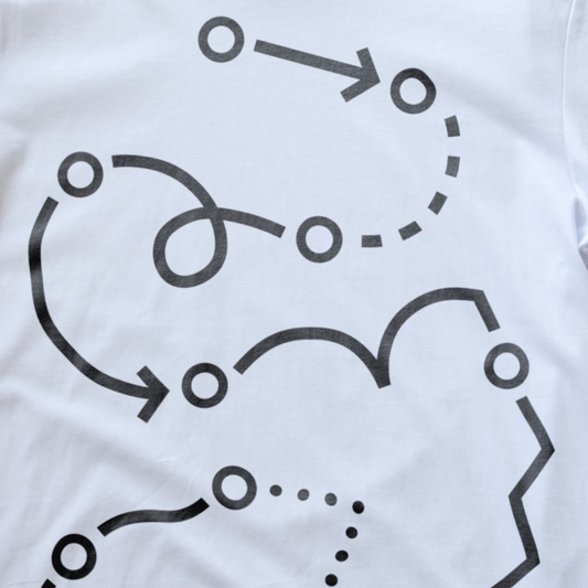 White fabric modular synth t-shirt with a black abstract line and dot graphic printed across it.