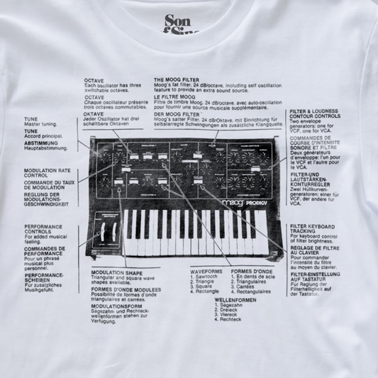 A white synth t-shirt with a printed manual featuring a black-and-white schematic diagram of a Prodigy synthesizer.