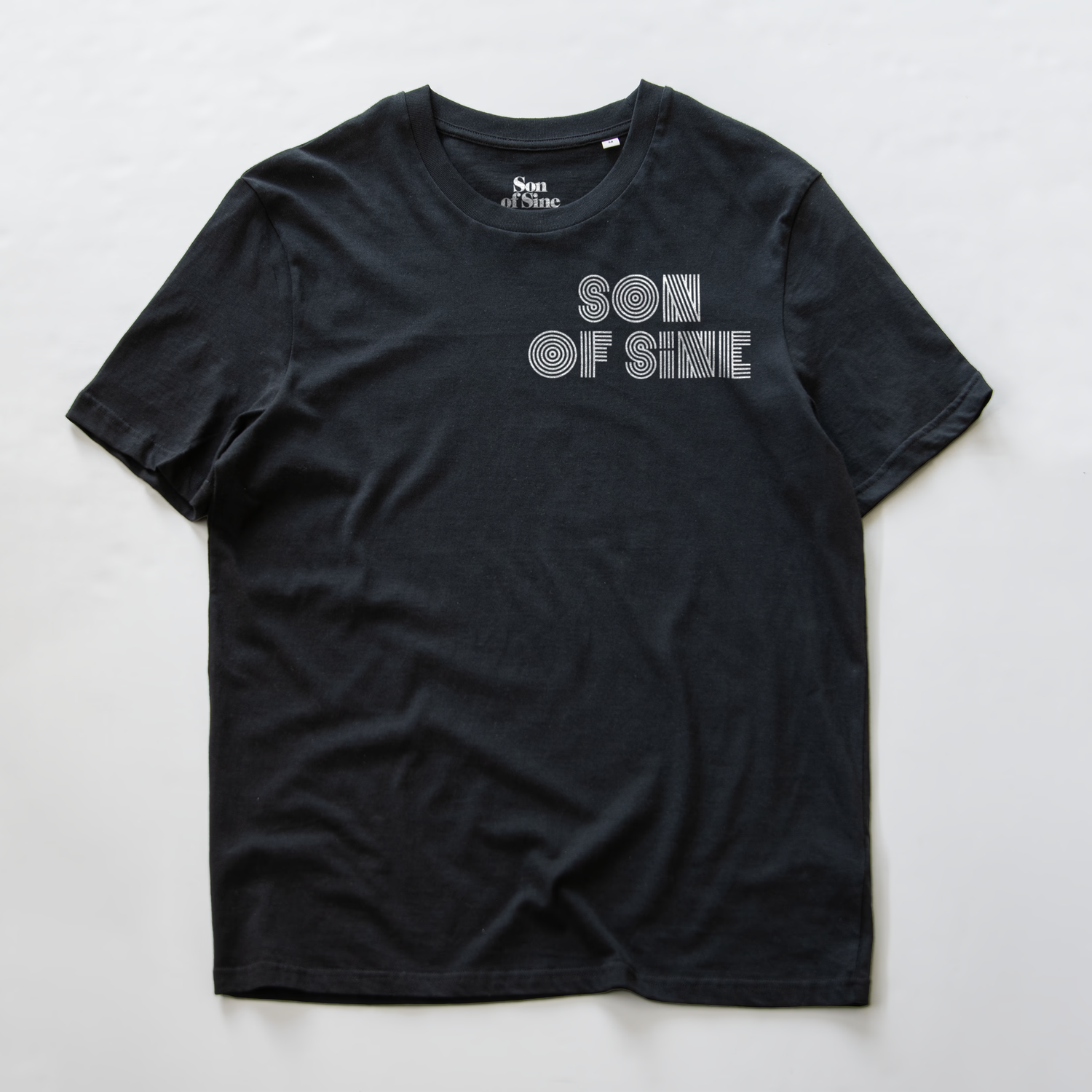 A black synth inspired t-shirt with 'SON OF SINE' printed in a white striped font on the chest.