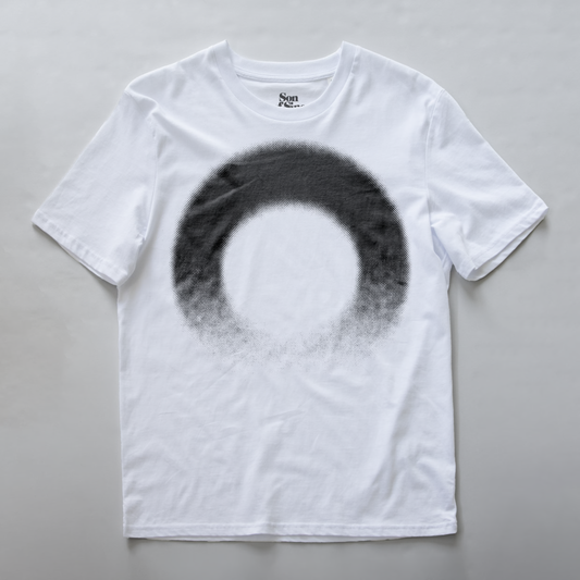 A white modular synth t-shirt with a large black circular ring graphic printed on the front.