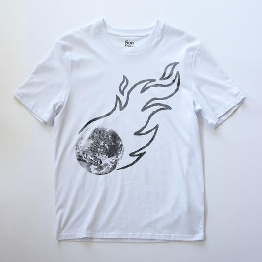 White electronic music t-shirt featuring a graphic print of a silver disco mirror ball with black flame-like lines rising from it.