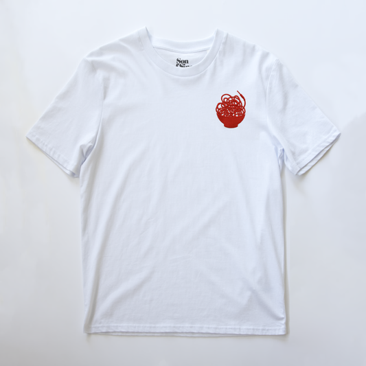 A white synth t-shirt with a small red graphic of a messy noodle bowl overspilling with patching modular synth cables.