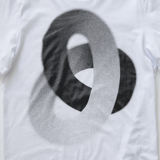 White synth T-shirt with a large abstract interlocking ring graphic in black and gray on the front.