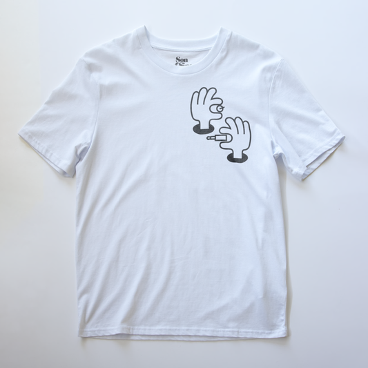 A white modular synth t-shirt with a black graphic of two cartoon hands on the chest.